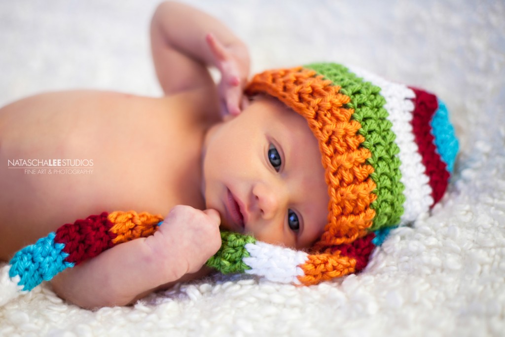 Denver Newborn baby with colorful knit hat - Baby Portraits